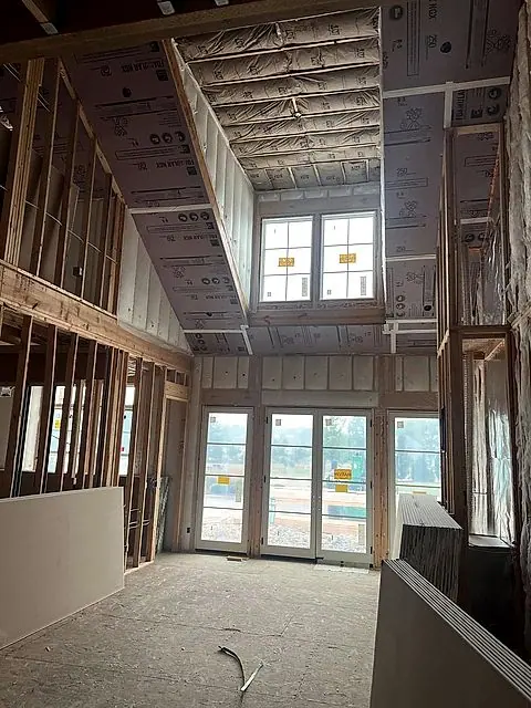 Two-story wall hung with drywall by the Mendoza Rodriguez crew in Lorain, Ohio