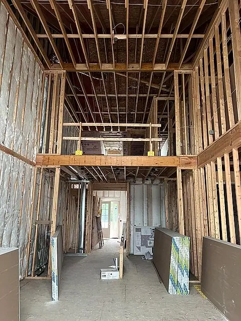 Two-story interior framed and ready for drywall hanging in Lorain, Ohio